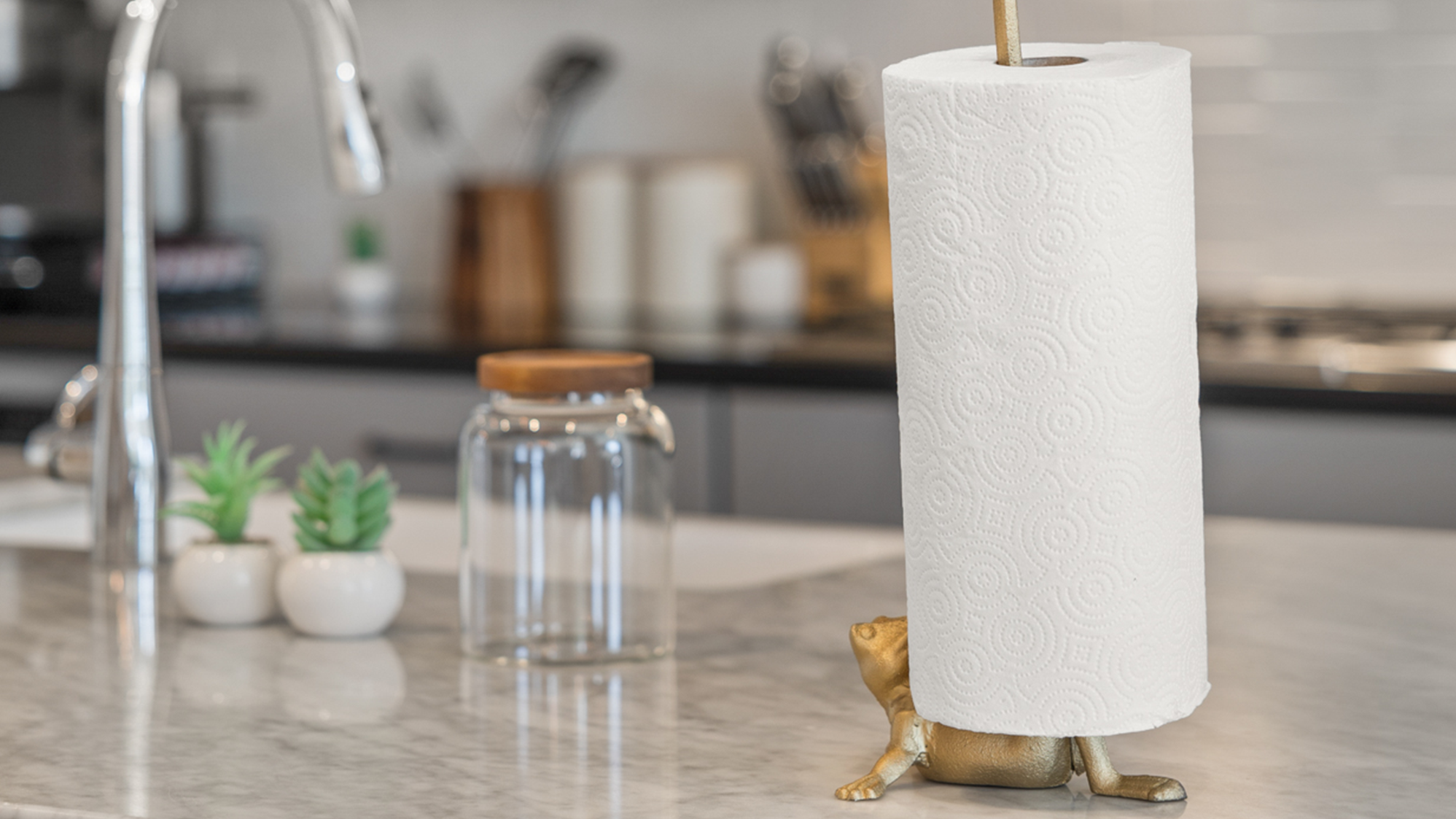 Gold frog cast iron toilet paper holder and paper towel holder with weighted base prevents tipping